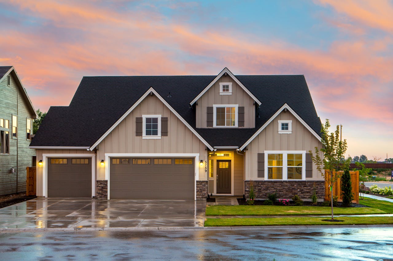 our-services-2 Charming family home in Boise, ID with a modern facade and spacious garage.
