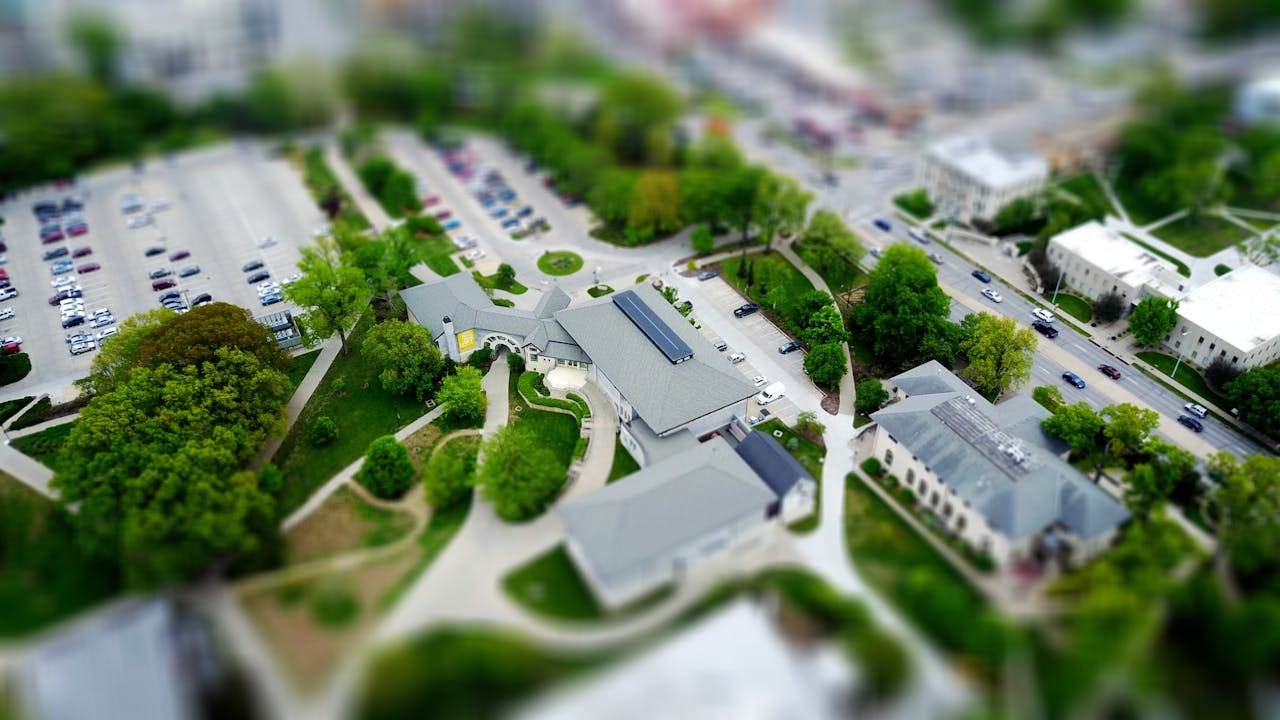 gallery-4 Aerial view of campus with green landscaping and parking, Manhattan, KS